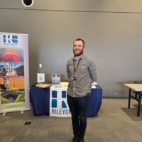 UW Bothell Tech & Engineering Fair RGI's Booth and Geotechnical Recruiter, Collin McCracken, PE, LG